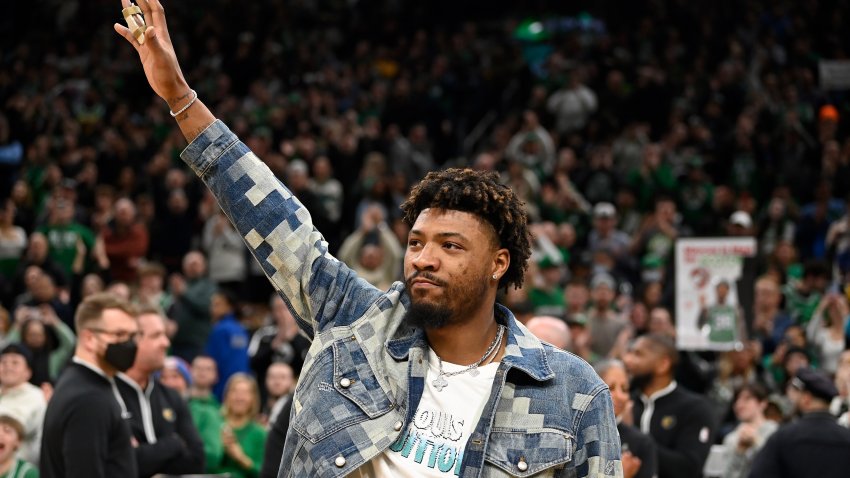 Feb 4, 2024; Boston, Massachusetts, USA;  Memphis Grizzlies guard Marcus Smart (36)  waves to fans during the first half against the Boston Celtics at TD Garden. Mandatory Credit: Eric Canha-USA TODAY Sports